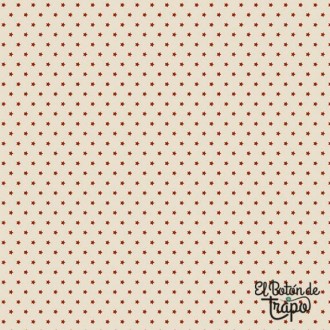 Tela Patchwork Marcus Fabrics crema con estrellas rojas Colección Home