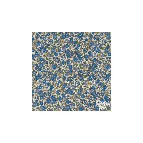 Tela Plastificadad Beige con Flores Azules de Frou-Frou